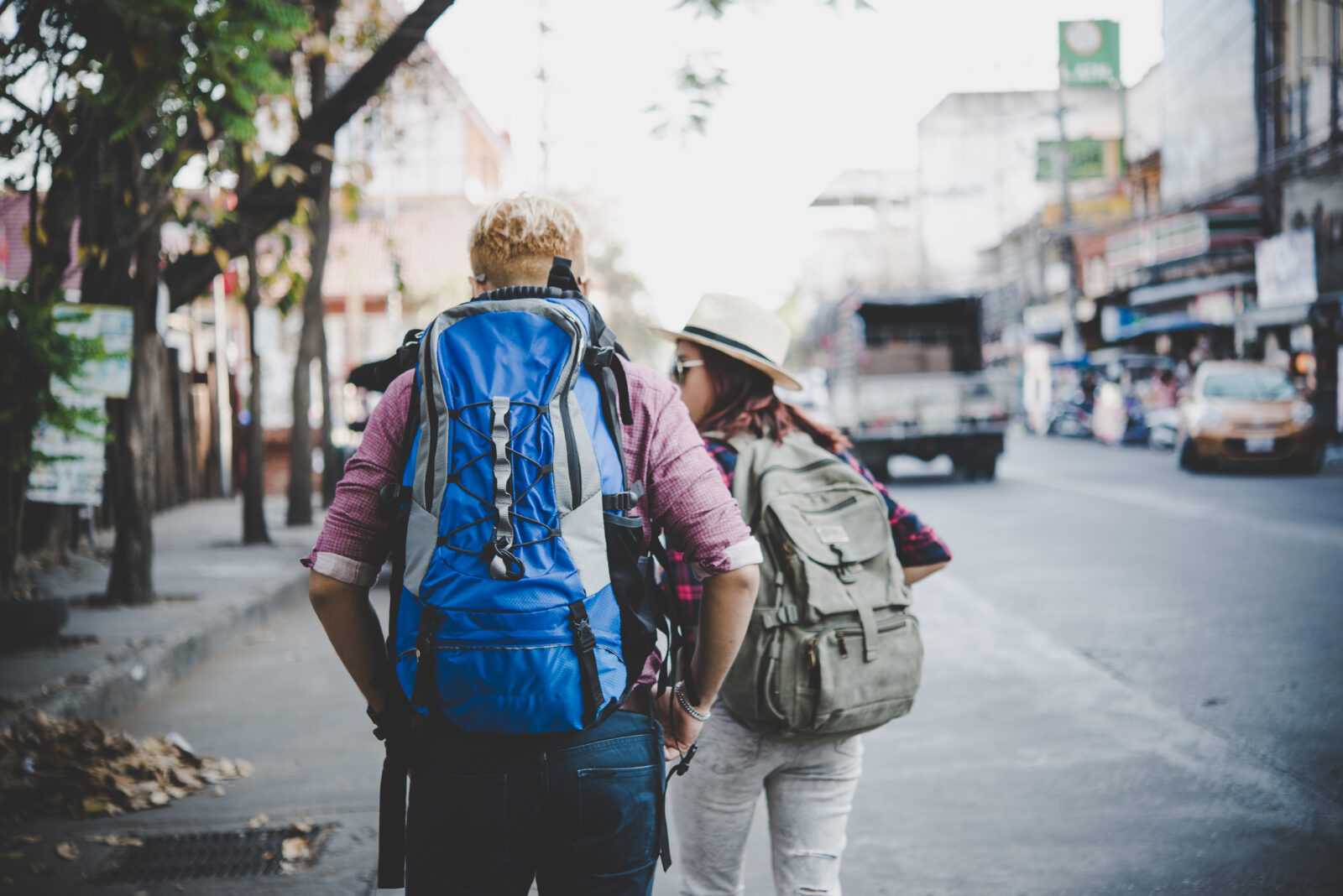 travel-couple-walking-around-city-on-vacation-havi-2026-03-17-01-34-50-utc