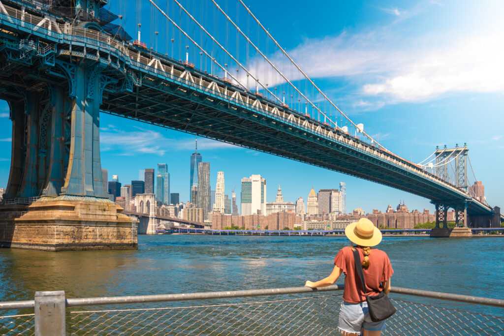 young-woman-enjoying-view-of-city-skyline-in-new-y-2026-03-17-00-05-06-utc